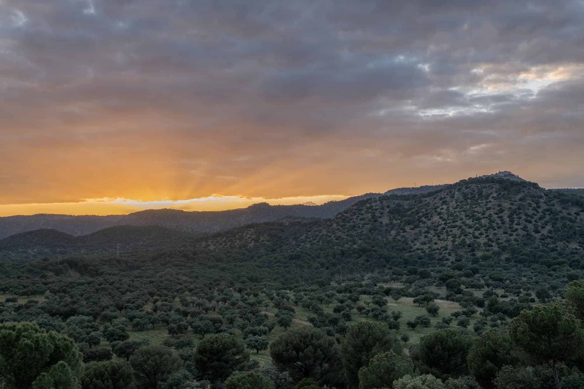 Sunset over the sierra ridges above El Encinarejo, Spain